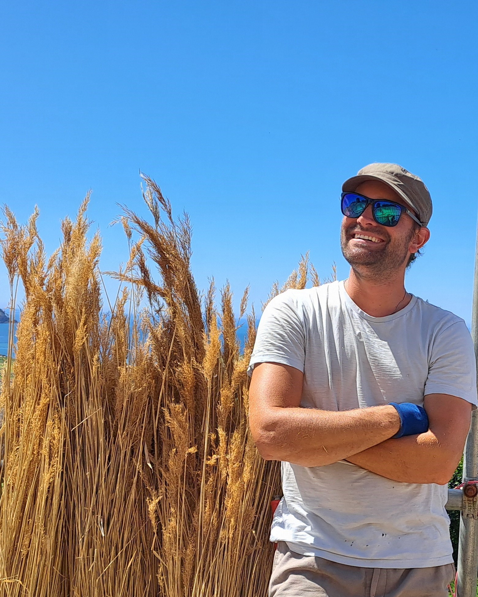 Master Thatcher Luke Robinson working on traditional thatched roofs in Somerset, Devon, Dorset and beyond