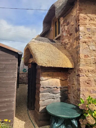 Thatched porch in water reed in Somerset
